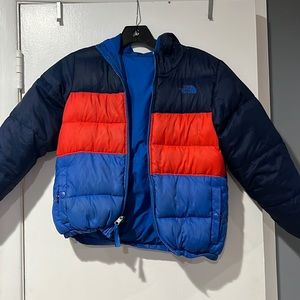 North Face boys small reversible snow jacket. Fits like a 6-8.